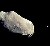 Двойной астероид Ida - Dactyl (Август 1993г) . Расстояние до астероида - 10500км (миссия Galileo)